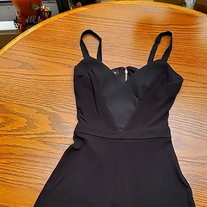 Bebe jumpsuit elegant black open back size 00